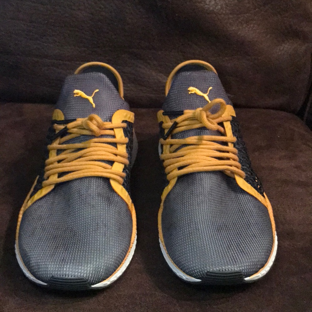 Puma net fit! Never worn, size 12 will fit an 11!